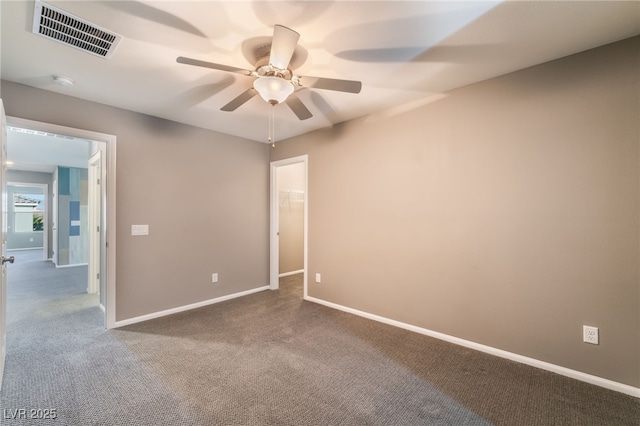 7219 Quiet Spring St, North Las Vegas, NV 89084 - carpeted empty room with visible vents, ceiling fan, and baseboards