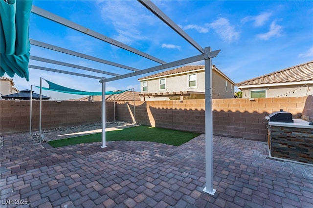 7219 Quiet Spring St, North Las Vegas, NV 89084 - view of patio with a pergola and a fenced backyard