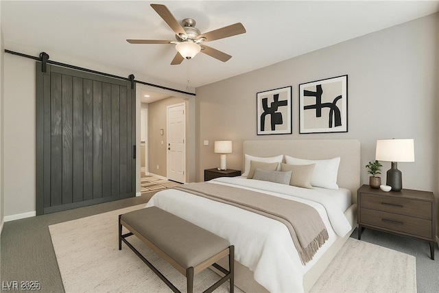 7219 Quiet Spring St, North Las Vegas, NV 89084 - carpeted bedroom featuring a barn door, a ceiling fan, and baseboards