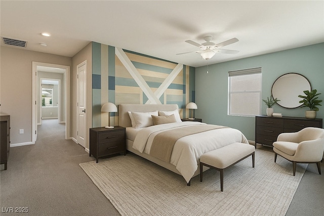 7219 Quiet Spring St, North Las Vegas, NV 89084 - bedroom with a ceiling fan, visible vents, baseboards, wallpapered walls, and light colored carpet