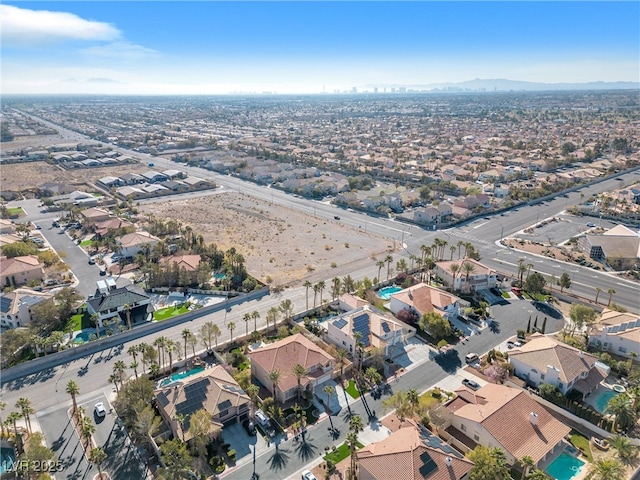 bird's eye view with a residential view and a mountain view