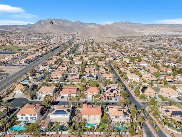 drone / aerial view with a mountain view and a residential view