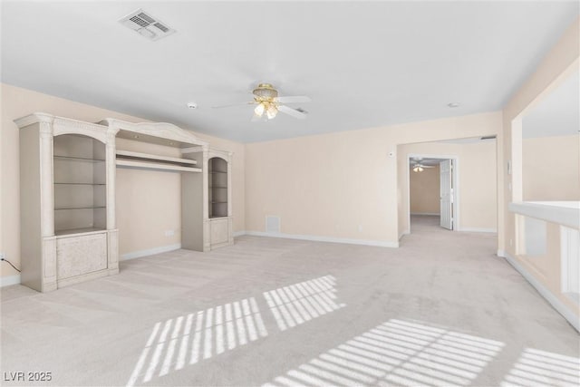 unfurnished bedroom with visible vents, light carpet, a ceiling fan, a closet, and baseboards