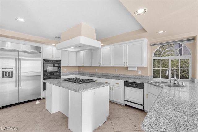 kitchen with white cabinetry, dishwasher, built in refrigerator, gas stovetop, and a sink