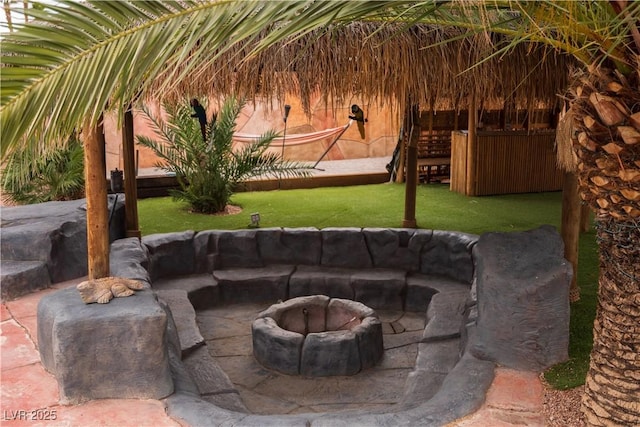 view of patio featuring a fire pit