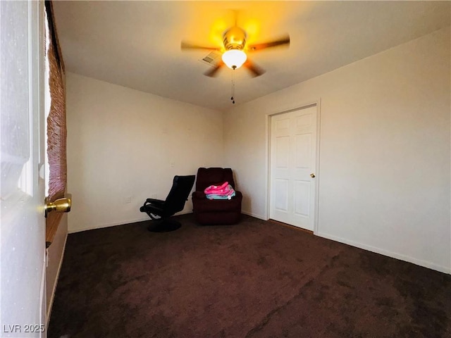 unfurnished room featuring carpet flooring, a ceiling fan, and visible vents