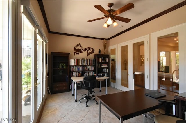 office space with french doors, light tile patterned flooring, ceiling fan, and crown molding