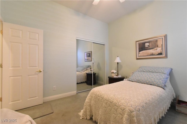 bedroom featuring a ceiling fan, carpet flooring, baseboards, and a closet