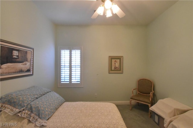 carpeted bedroom with a ceiling fan and baseboards