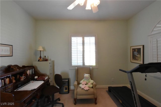 office with baseboards, carpet floors, and a ceiling fan