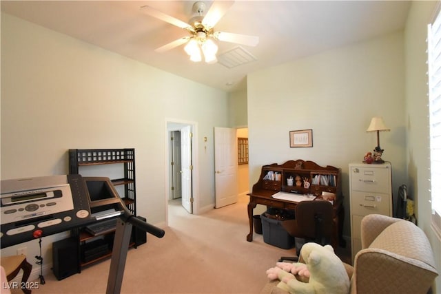 bedroom featuring ceiling fan and carpet