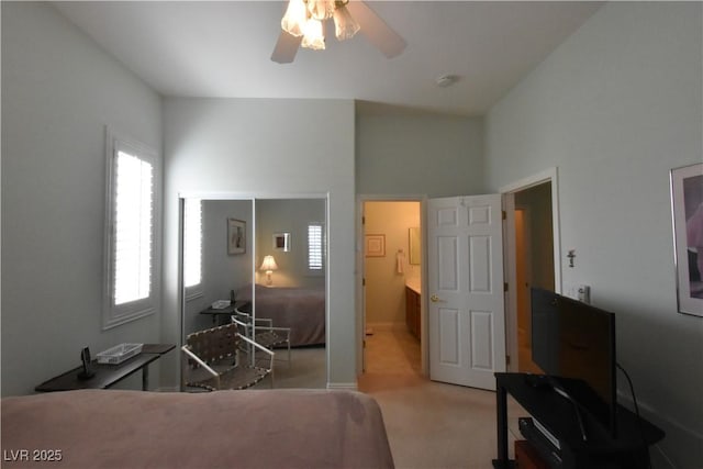 carpeted bedroom with a ceiling fan