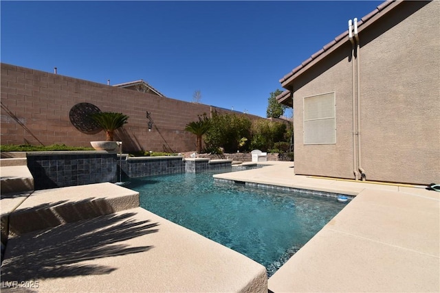 view of swimming pool featuring a patio area, a fenced backyard, and a fenced in pool