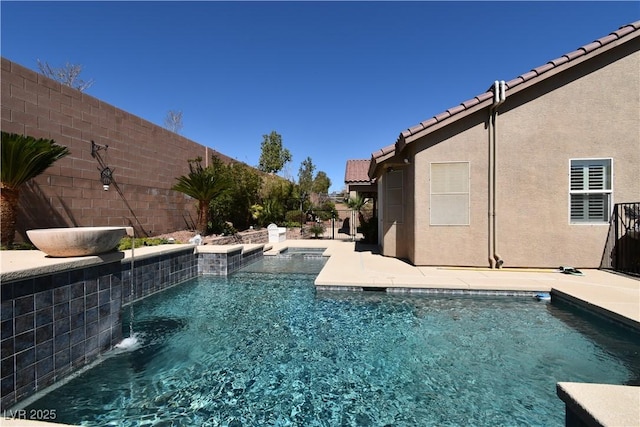 view of swimming pool featuring a fenced in pool and a fenced backyard