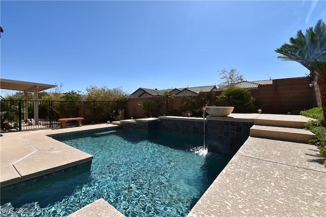 view of pool with a fenced in pool, a patio, and a fenced backyard