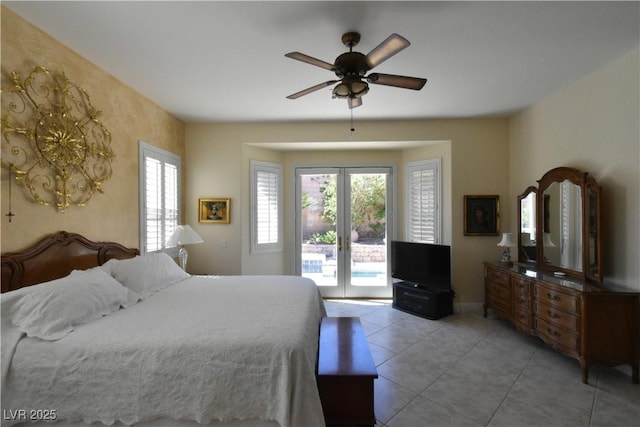 bedroom featuring light tile patterned floors, ceiling fan, and access to outside