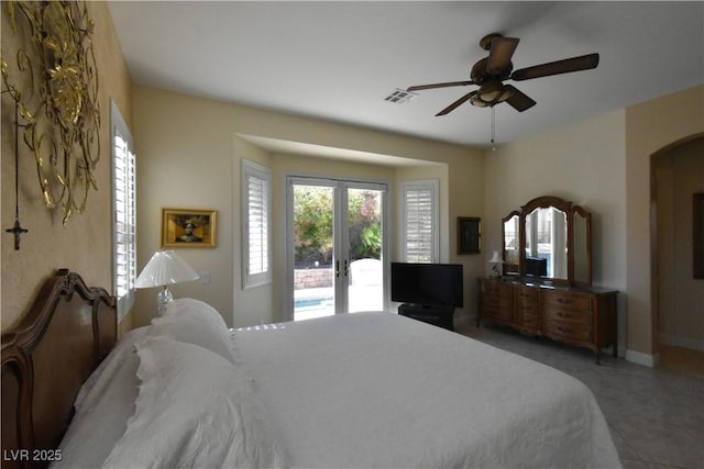 bedroom featuring visible vents, baseboards, ceiling fan, and access to outside