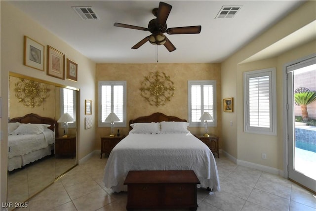 bedroom with a ceiling fan, access to outside, baseboards, and visible vents