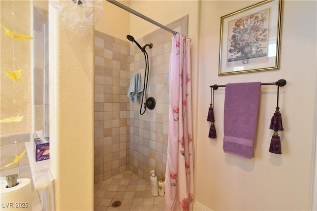 bathroom featuring a stall shower