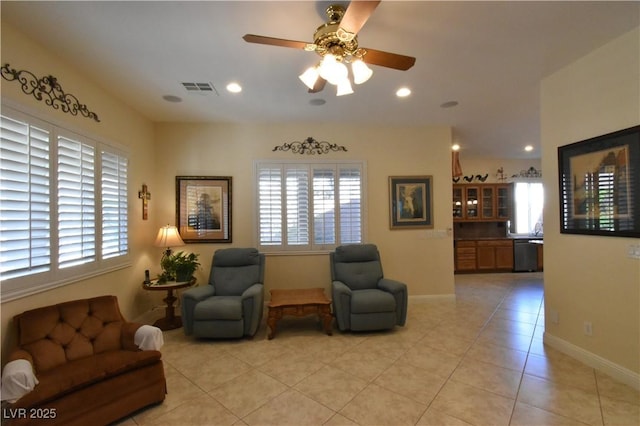 sitting room featuring recessed lighting, visible vents, plenty of natural light, and ceiling fan