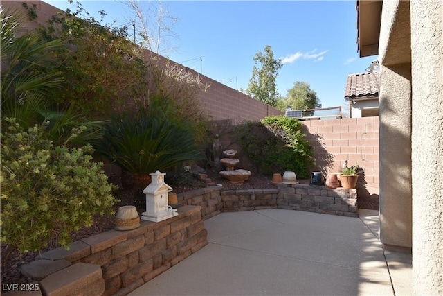 view of patio / terrace with fence