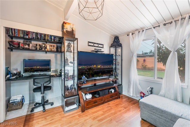 home office featuring wood ceiling, lofted ceiling with beams, and wood finished floors