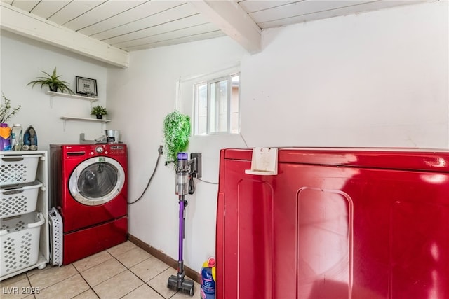 clothes washing area with tile patterned floors, laundry area, independent washer and dryer, and wood ceiling