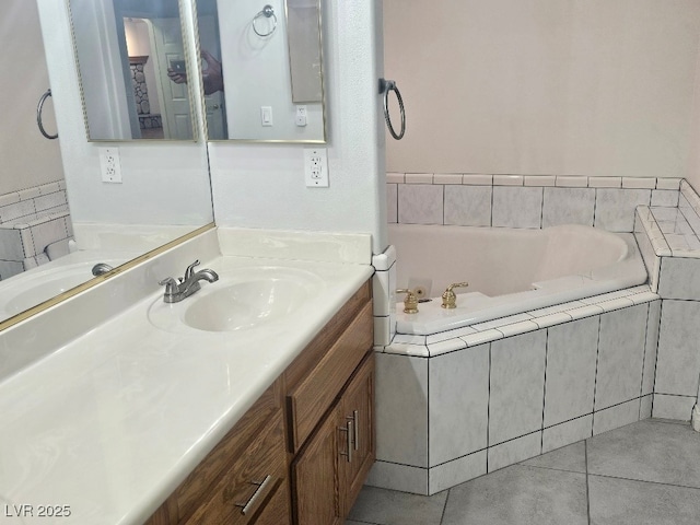 bathroom featuring a bath, vanity, and tile patterned flooring