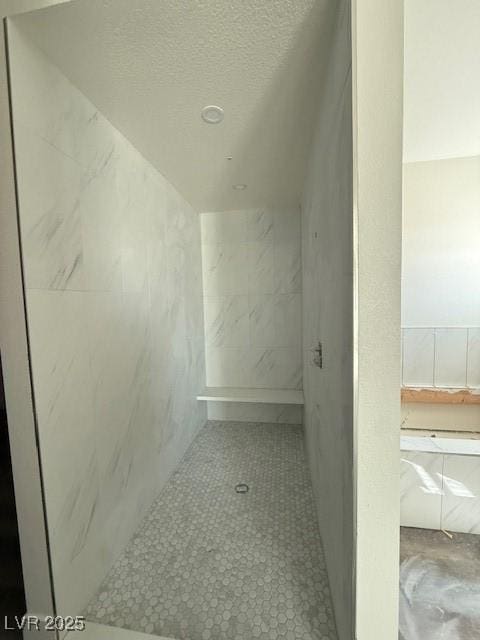 bathroom featuring a textured ceiling