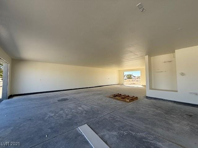 interior space featuring unfinished concrete floors