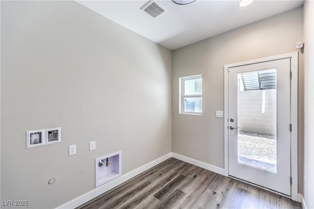 8629 Ensworth St Unit 114, Las Vegas, NV 89123 - laundry area with washer hookup, wood finished floors, and hookup for a gas dryer