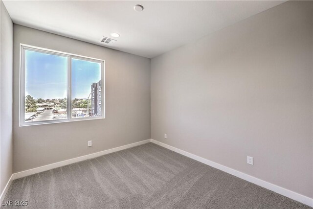 8629 Ensworth St Unit 114, Las Vegas, NV 89123 - carpeted spare room with baseboards