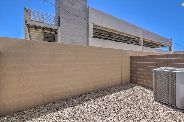 8629 Ensworth St Unit 114, Las Vegas, NV 89123 - view of side of home with a central AC unit