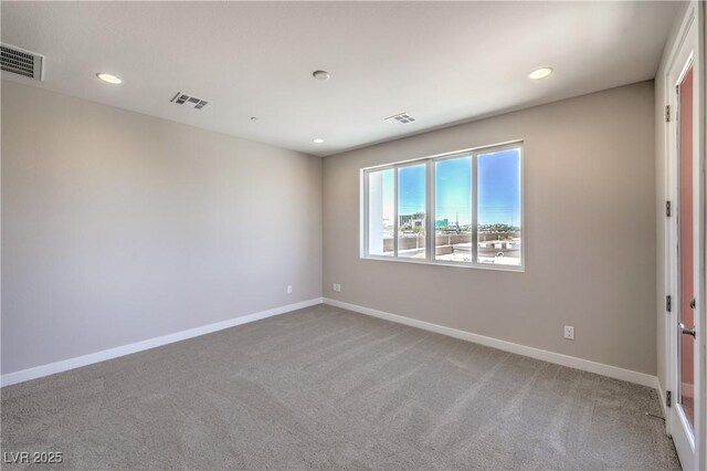 8629 Ensworth St Unit 114, Las Vegas, NV 89123 - carpeted empty room with recessed lighting