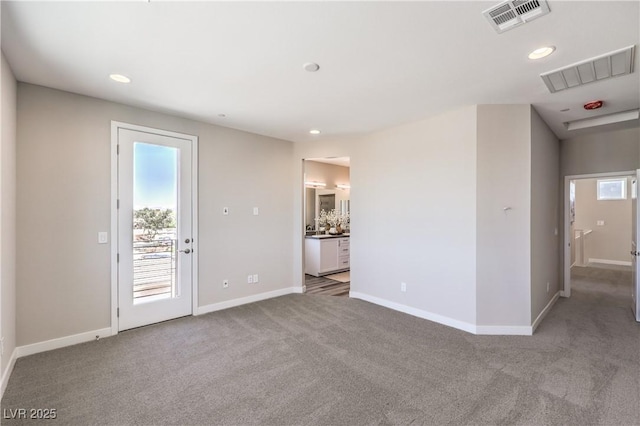 8629 Ensworth St Unit 114, Las Vegas, NV 89123 - carpeted spare room with recessed lighting