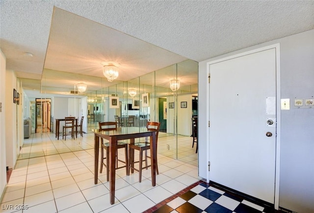 dining area with a textured ceiling
