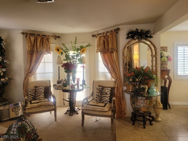 4019 Delos Dr, Las Vegas, NV 89103 - sitting room featuring light tile patterned floors and visible vents