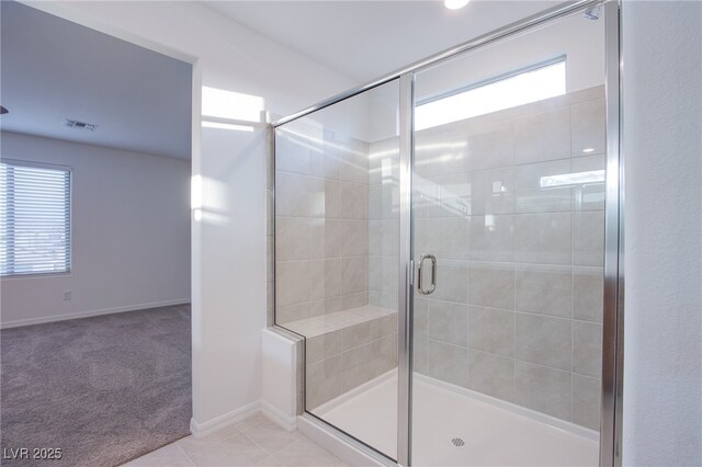 5748 Avondale Rise Way, Las Vegas, NV 89141 - bathroom featuring a stall shower, baseboards, and tile patterned flooring