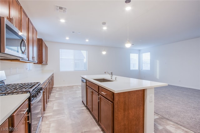 5748 Avondale Rise Way, Las Vegas, NV 89141 - kitchen featuring stainless steel appliances, a sink, baseboards, pendant lighting, and light countertops