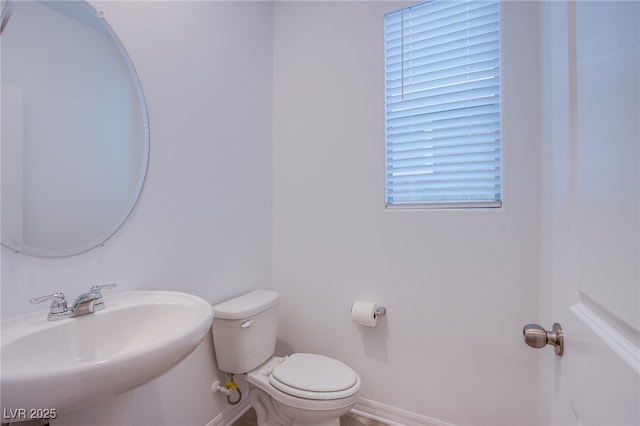 5748 Avondale Rise Way, Las Vegas, NV 89141 - bathroom with a sink, toilet, and baseboards