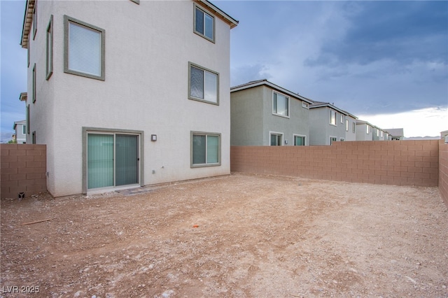 5748 Avondale Rise Way, Las Vegas, NV 89141 - rear view of property featuring a fenced backyard and stucco siding