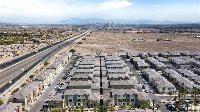 drone / aerial view with a residential view and a mountain view