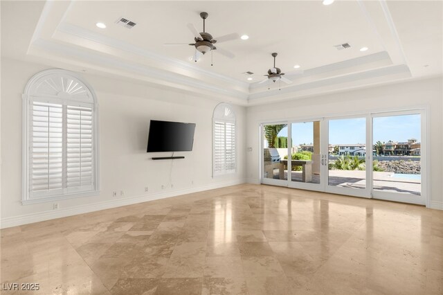 2660 Mirabella St, Henderson, NV 89052 - unfurnished living room with baseboards, a ceiling fan, a tray ceiling, and recessed lighting