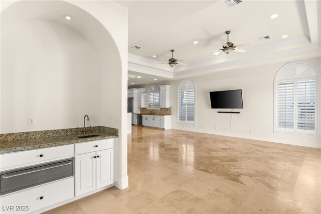 2660 Mirabella St, Henderson, NV 89052 - bar with a ceiling fan, a sink, a warming drawer, a tray ceiling, and visible vents