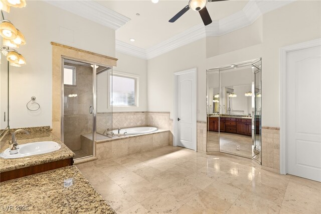 2660 Mirabella St, Henderson, NV 89052 - bathroom with a bath, a sink, a stall shower, ceiling fan, and crown molding
