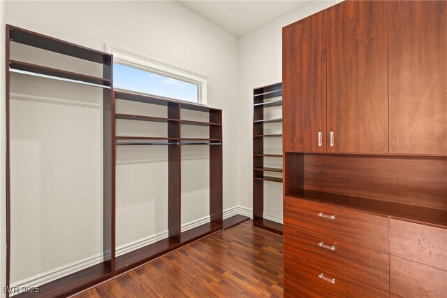 2660 Mirabella St, Henderson, NV 89052 - walk in closet with dark wood finished floors