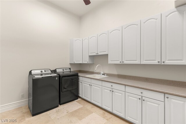 2660 Mirabella St, Henderson, NV 89052 - clothes washing area featuring a ceiling fan, a sink, cabinet space, washing machine and dryer, and baseboards