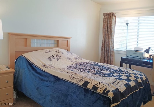 bedroom featuring carpet flooring