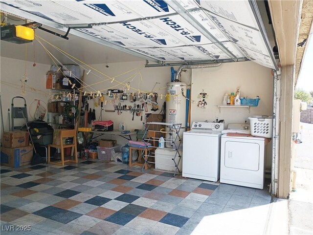 6412 Big Pine Way, Las Vegas, NV 89108 - garage featuring a garage door opener, washer and clothes dryer, water heater, and a workshop area