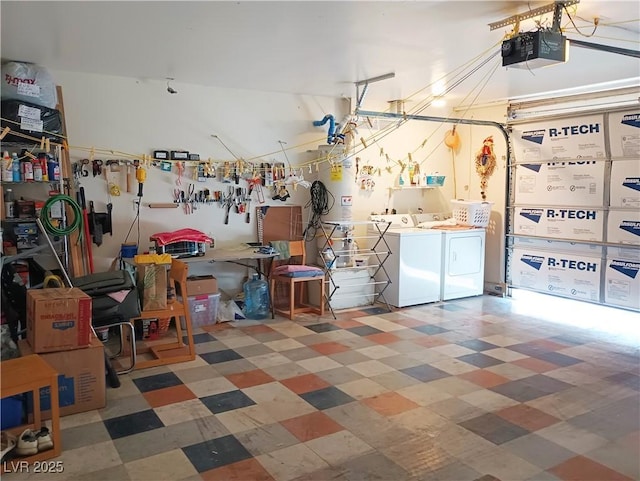 garage featuring washer and dryer and a garage door opener